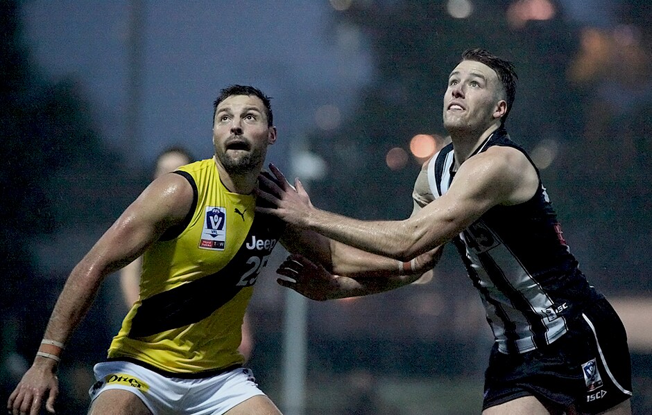 VFL-RD17.png Max Lynch and Toby Nankervis brave the wet conditions at the Holden Centre. Photo: Shane Barrie - Collingwood Magpies,Tag-Match Report